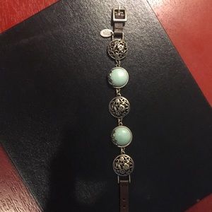 Silver tone and blue stone and leather bracelet